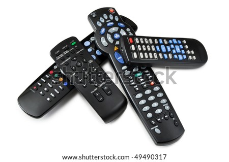 four remote controllers isolated on a white background