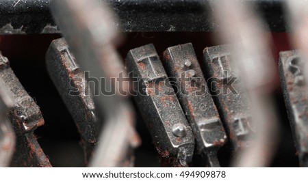 picture of a closeup of old dirty and dusty typewriter buttons