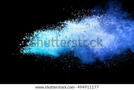 abstract blue powder splatted background,Freeze motion of color powder exploding/throwing color powder,color glitter texture on black background