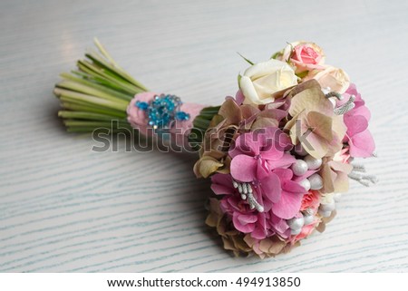 delicate bridal bouquet on the table with a tablecloth as a picture
wedding floristry
beautiful floral arrangement