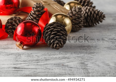 Close-up view of pine cones on old wooden background