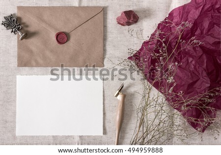 Mockup with envelope, wax seal, nib pen, blank card and dry flowers. Wedding, calligraphy vintage stationary.
