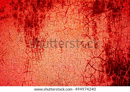 red burgundy metal plate with cracked paint and big paint spots because of time as background, metal wall with rusty spots and cracked paint as texture, toned to color, high quality resolution