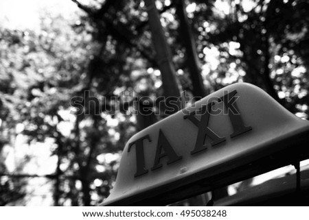 Taxi sign of Tuk Tuk; the traditional transportation in Thailand. Shoot in black and white shot.