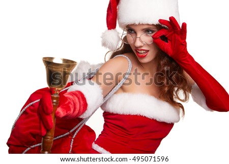 christmas, x-mas, winter and people concept - smiling woman in santa helper hat with jingle bells 