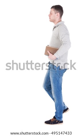 man goes and has a stack of books. back view. Rear view people collection.  backside view of person.  Isolated over white background.