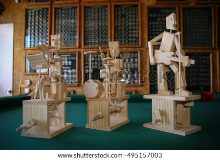 wood crafts in the form of toys depicting musicians playing musical instruments