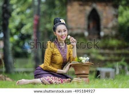 Beautiful girl in Laos costume.Lao traditional dress of a beautiful woman.