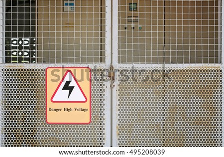 Danger High Voltage Sign on metal door lock