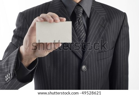 Business man handing a blank business card .for text, or your own message.
