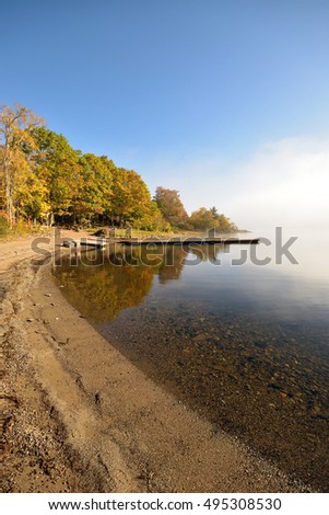 Fall Morning on the Beach (fog is burning off on the water)  Picture taken on the Saint John River at Belleisle, New Brunswick Canada