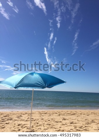Sun light parasol and deep blue sky outdoors background