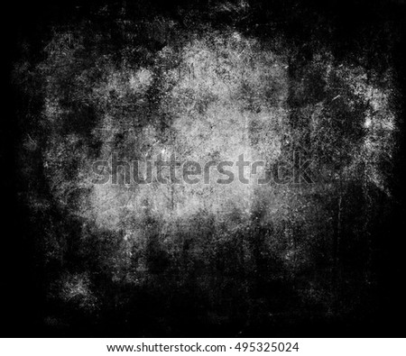 Beautiful dark abstract vintage grunge background with faded central area for your text or picture, scratched scary halloween background with frame