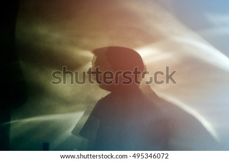 Blurry shadow of head man