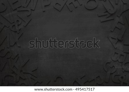 Black board texture alphabet frame background
