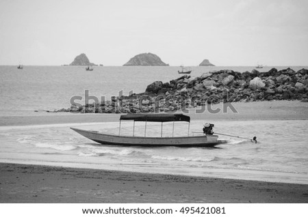 Fishing boat black and white picture.