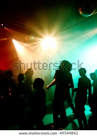 Dancing people in a disco