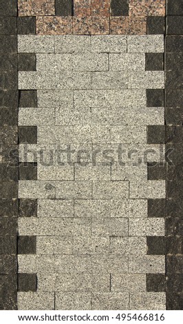 Mosaic tiles pavement background. Triangle paving. Aged photo. Black and white.