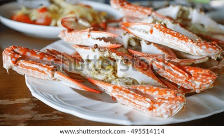 Steamed Crab Seafood Large crab cooked in red, orange                                       