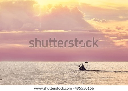 Fishing boat in sea, silhouette picture