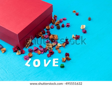 Red gift boxe on blue wooden table, Christmas and happy new year