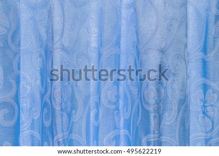 Blue color curtain use for background. picture for backdrop or add text message. background web design.