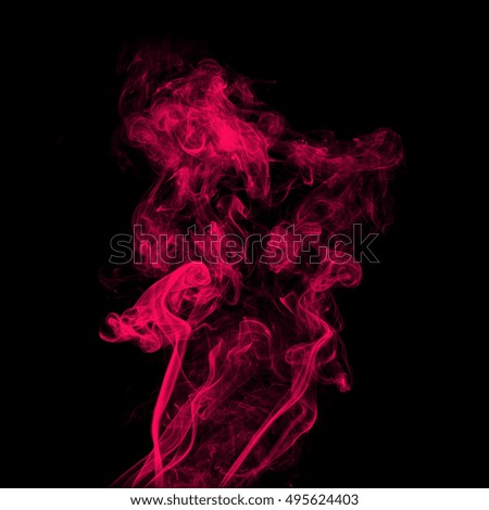 pink smoke abstract on black background, darkness concept. movement of smoke ink. Abstract design of pink powder cloud against dark background.
