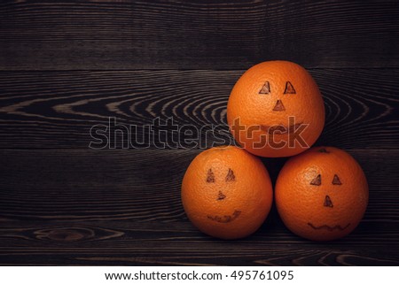 Halloween still life with orange