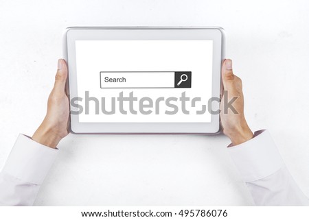 Close up of businessman hand holding a digital tablet with search bar on the screen, isolated on white background