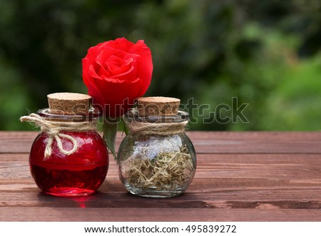 Aromatherapy and natural cosmetics. Rose oil and seaweed for hair care and skin.