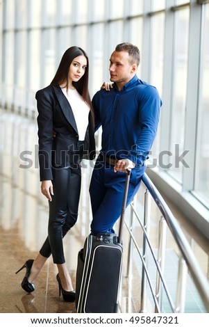 Couple in love on vacation. Couple standing in the airport.