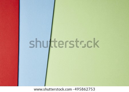 Colored cardboards background red blue green tone. Copy space. Horizontal