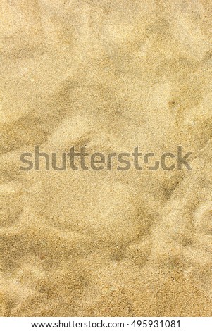 Beach sand closeup for background. Tropical beach macro photo. Exotic island sandy beach texture. Soft sand surface backdrop for vacation template, holiday card or banner. Seaside sand surface picture