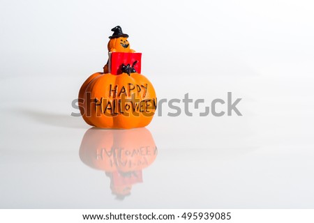orange pumpkin Halloween home decor on white background