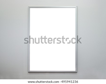 blank poster frame on concrete wall
