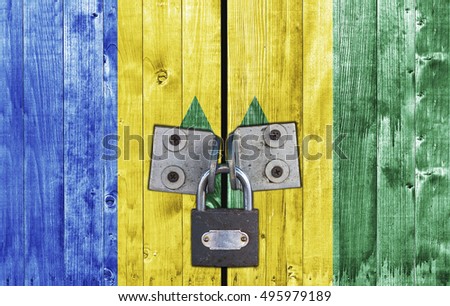 Saint Vincent and the Grenadines flag on door with padlock