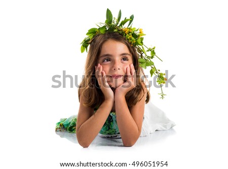 Cute girl with crown of flowers