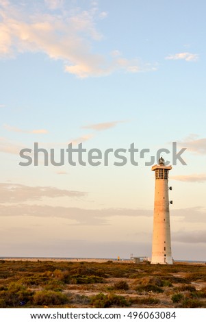 Photo Picture of an Old Lighthouse near the Sea