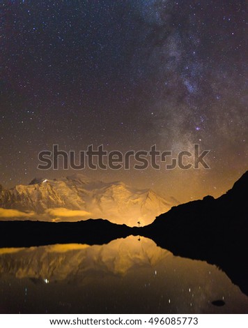 Mont Blanc and the milky way seen from Lac De Che�serys, Chamonix, France.