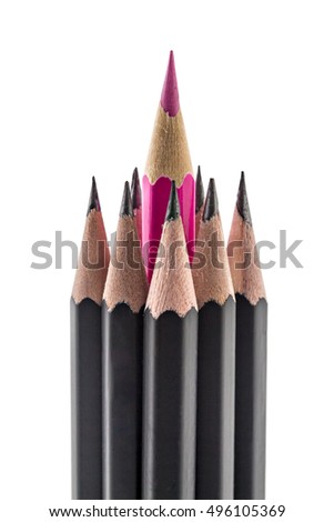 Red colored pencil jutting from a stack of black pencils, on white background