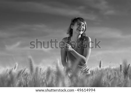 young woman under blue sky