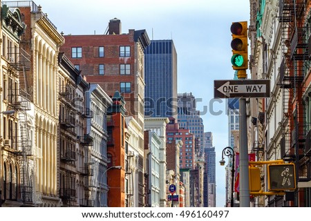 Intersection of Broadway and Spring Street in SOHO Manhattan, New York City Royalty-Free Stock Photo #496160497