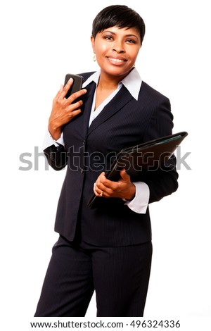 African American black businesswoman talking on phone isolated on black background