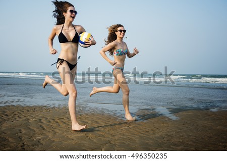 Women Friendship Playing Volleyball Beach Summer Concept