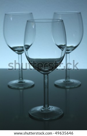 three empty wine glasses