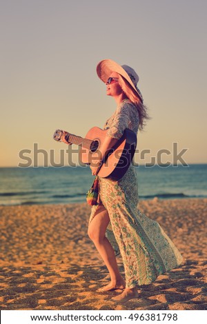 Romantic woman on seashore sunset walk outdoors background. 