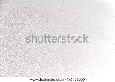 The concept of water drops on a white background Royalty-Free Stock Photo #496408000