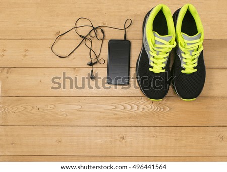Sports accessories for fitness on the wooden floor. Healthy lifestyle concept.