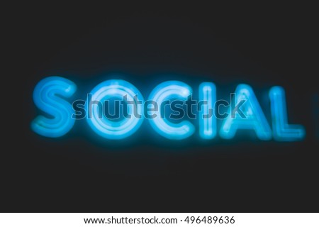 Neon Light of social,Abstract blurred photo of Social wording