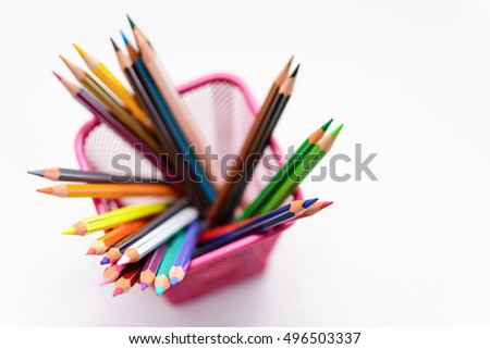 colored pencils and sharp in penholder blurred Royalty-Free Stock Photo #496503337